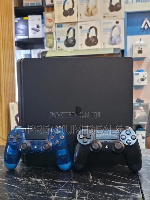 Chipped Ps4 Slim With 17games and Two Pads.
