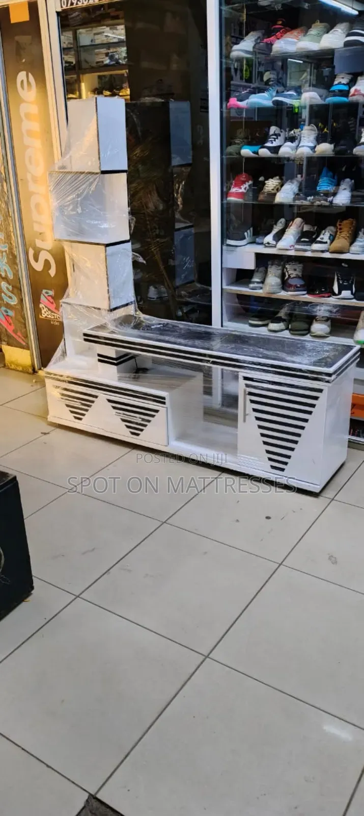 Tv Stand With Side Decor Shelves and Drawers + Free Home Delivery.
