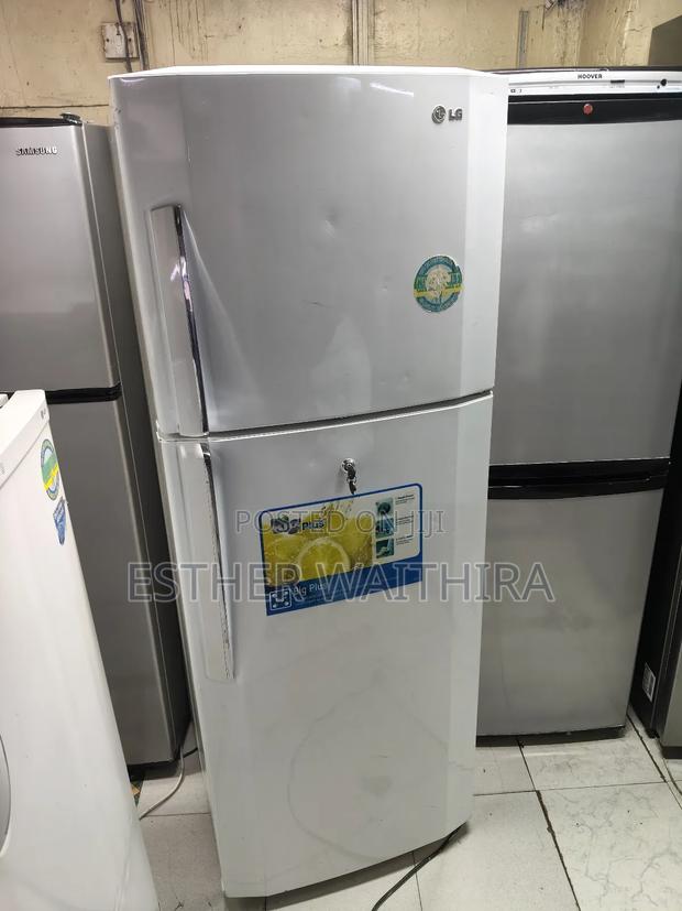 Lg White Well Maintained Fridge - main view