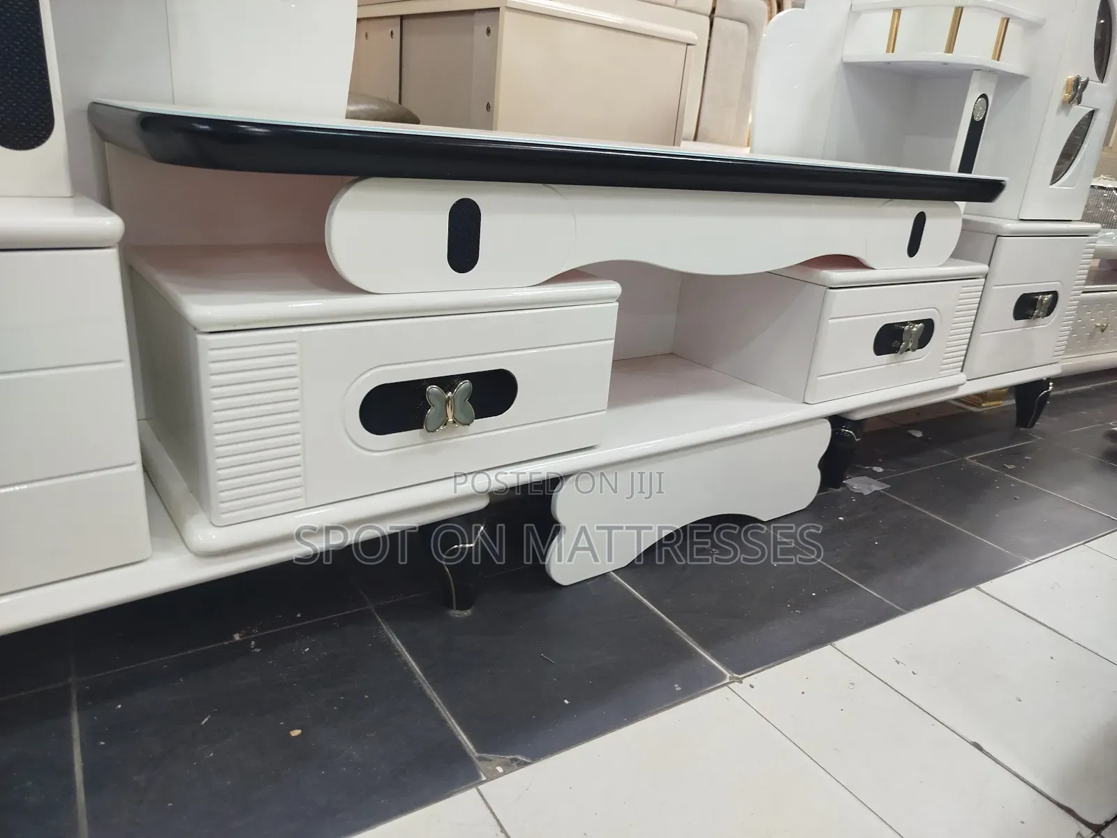 Extendable Tv Stand With Butterfly Decorations + Free Delivery.