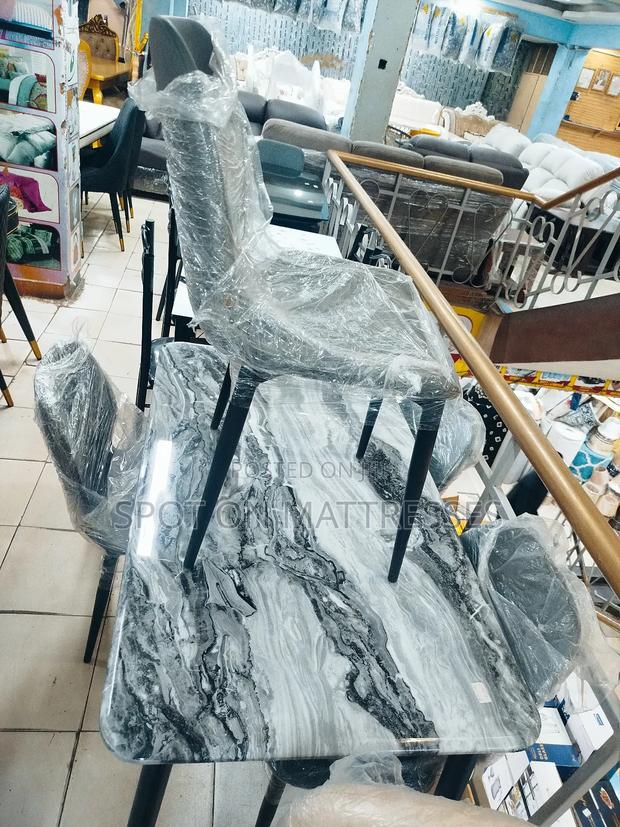 Imported Dining Set With Marble Top Table and 4 Leather Chairs. - thumbnail 3