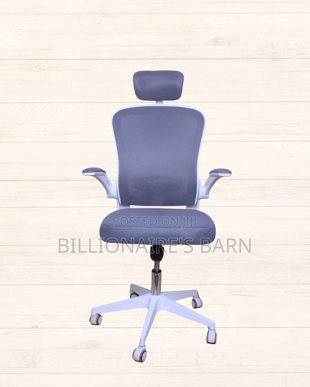 White Ergonomic Office Chair (Plush) — Moving Fast