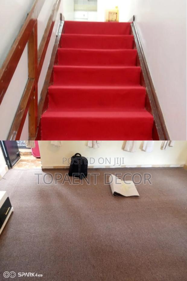 Flawless Flooring With Delta Brown and Red Wall to Wall Carpets