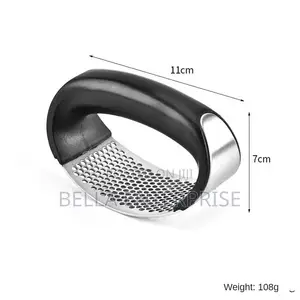 Handheld Garlic Press Available.