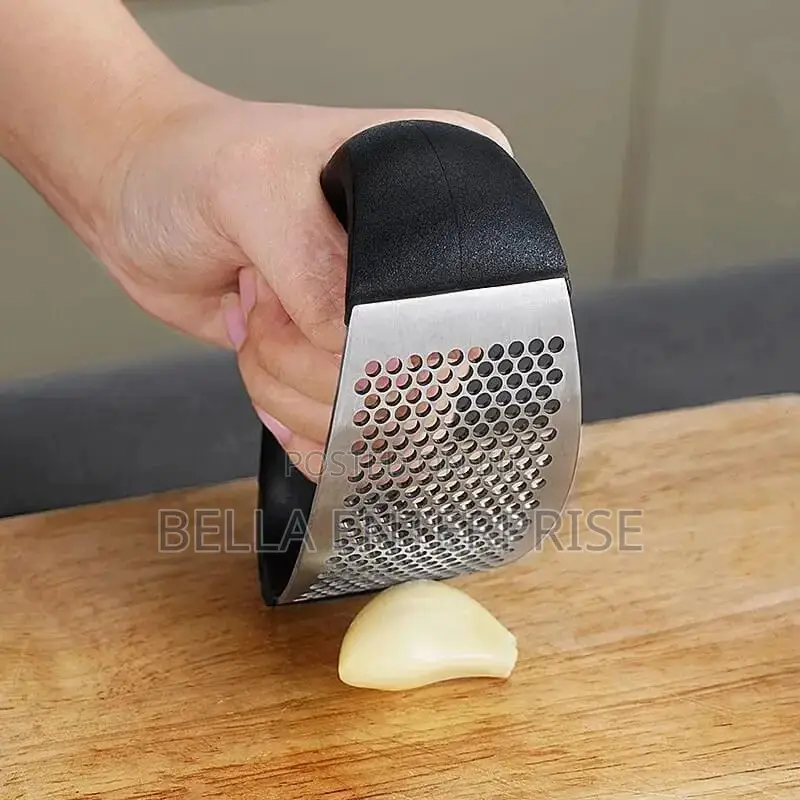 Handheld Garlic Press Available.