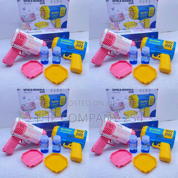 2 in 1 Bubble Gun. Colours: Blue and Pink 2 Pieces in a Box