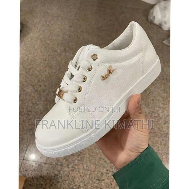 Signature Sneakers Available in Sizes 36-43. Price Kes 3200.