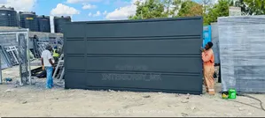 Simple Matte Black Sliding Gate for Your Home
