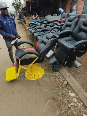 Adjusted Yellow Barber Chairs - thumbnail 2