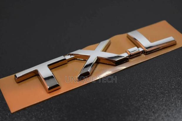 Silver Chrome TXL Car Emblem Logo - main view