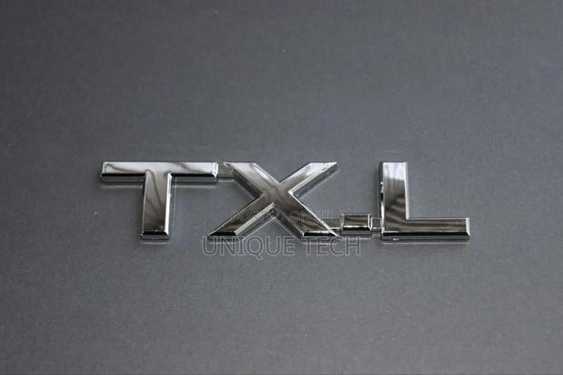 TXL Chrome Silver Badge Emblem
