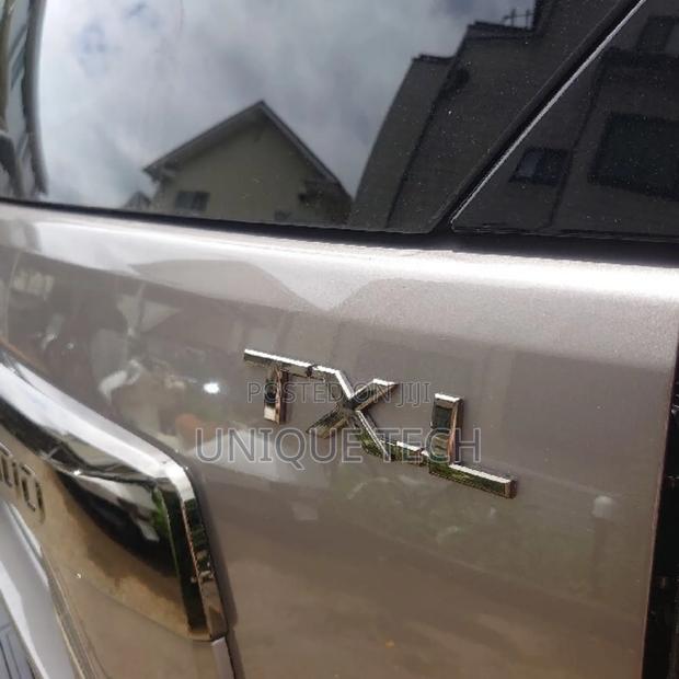 TXL Silver Chrome Boot Emblem Badge - main view