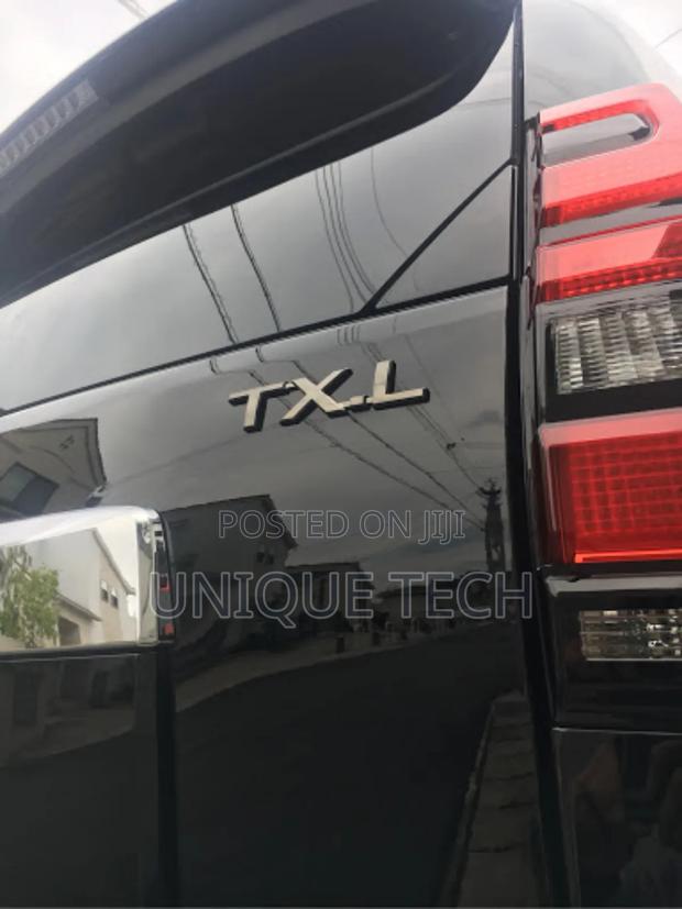 TXL Silver Chrome Boot Emblem Badge