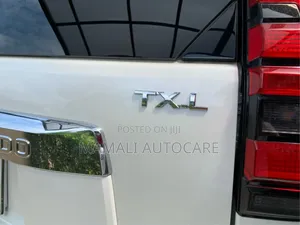 TXL Chrome Finish Silver Logo Emblem