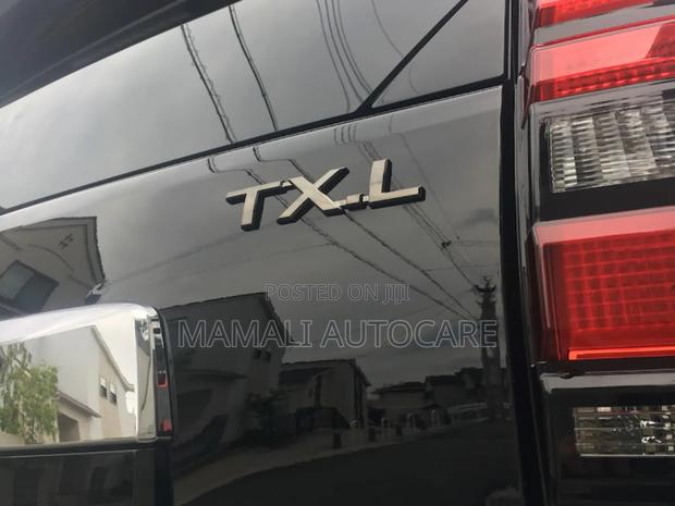TXL Silver Chrome Fender Emblem Logo - main view