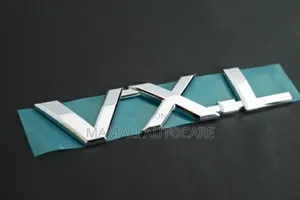 Silver VXL Chrome Logo Emblem