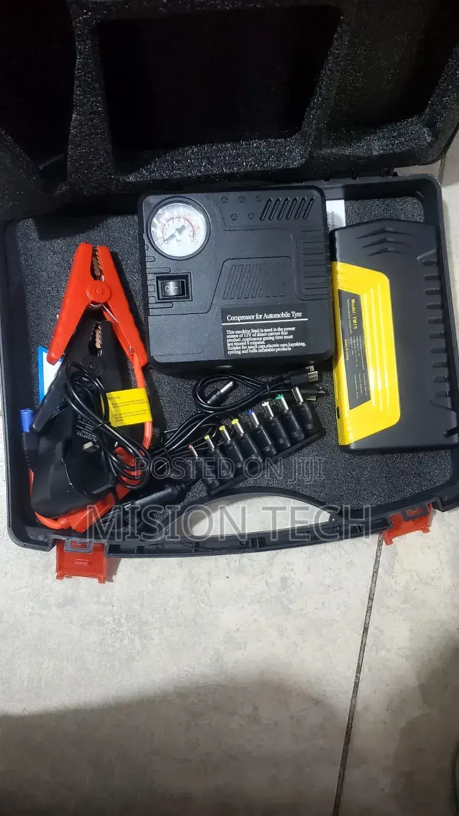 Portable Car Jump Starter Kit With a Built-in Air Compressor.