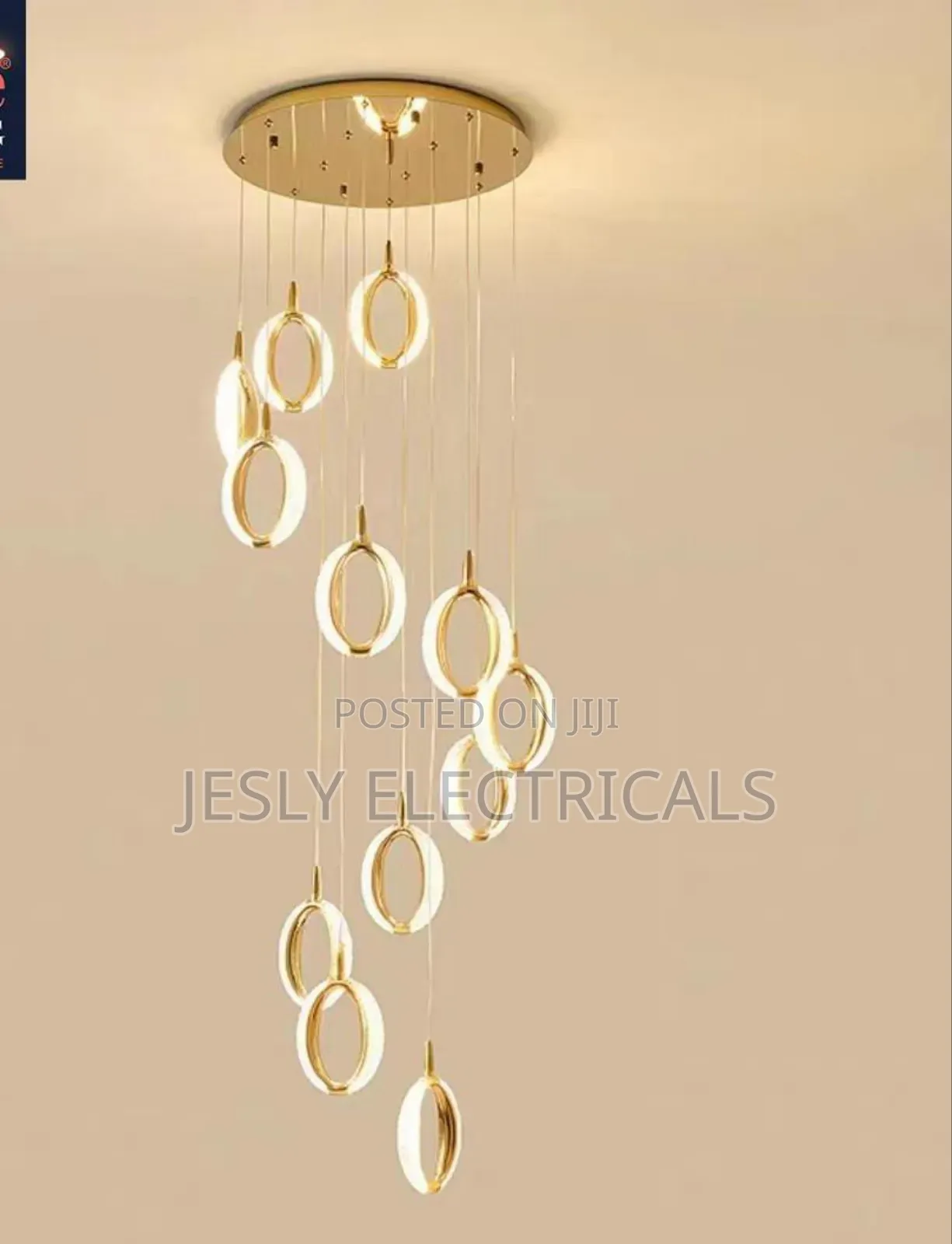 Modern Led Chandelier With a Gold Finish and Circular Rings.