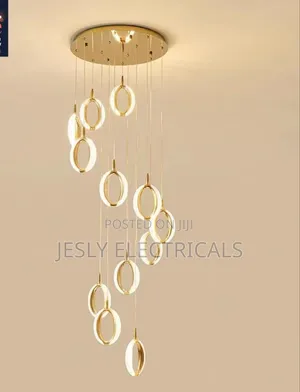 Modern Led Chandelier With a Gold Finish and Circular Rings.