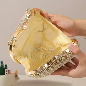Heart-Shaped Evening Clutch Bag With Rhinestones and Tassel Details*