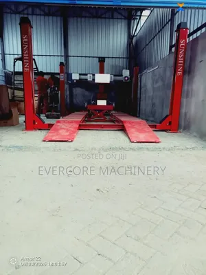 Commercial Wheel Alignment Machine With Four Post Carlift.
