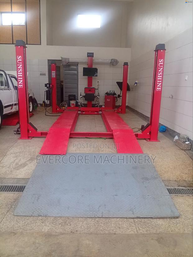 Fourpost Lift With Vehicle Wheel Alignment Machine 4tonne. - main view