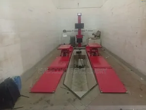 Fourpost Lift With Vehicle Wheel Alignment Machine 4tonne.