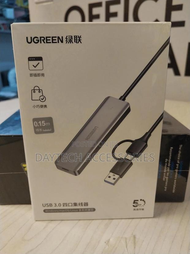 A Ugreen 2 in 1 Usb 3.0/Type-C 4-Port Hub Adapter (Model Cr113).
