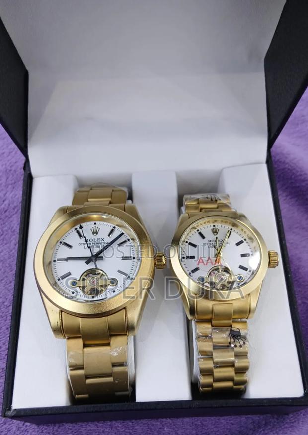 Two Gold-Toned Watches With White Dials. Wrist Watch - main view