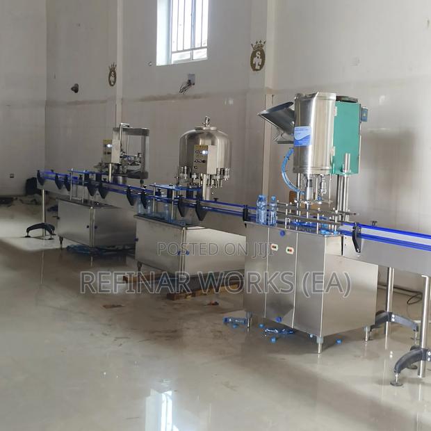 Automatic Filling Machine - Precision Bottling For Beverages