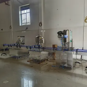 Automatic Filling Machine - Precision Bottling For Beverages