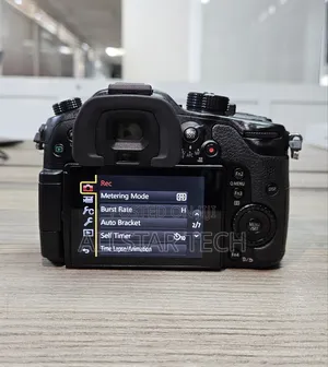 Panasonic Lumix Gh4 Mirrorless Camera With Lumix G Vario 14-42mm F/3.5