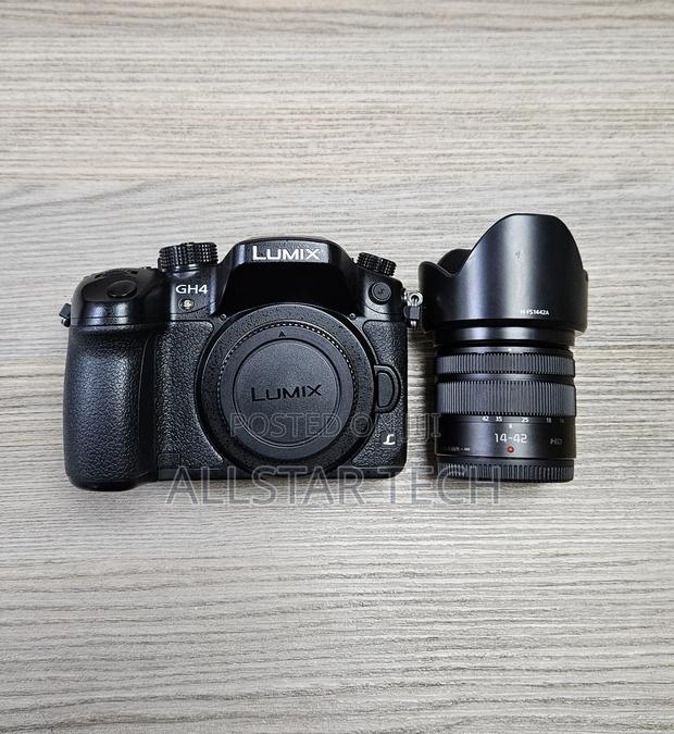 Panasonic Lumix Gh4 Mirrorless Camera With Lumix G Vario 14-42mm F/3.5