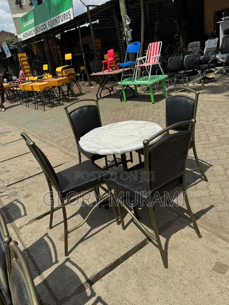 Black Set Restaurant Chairs And White Table