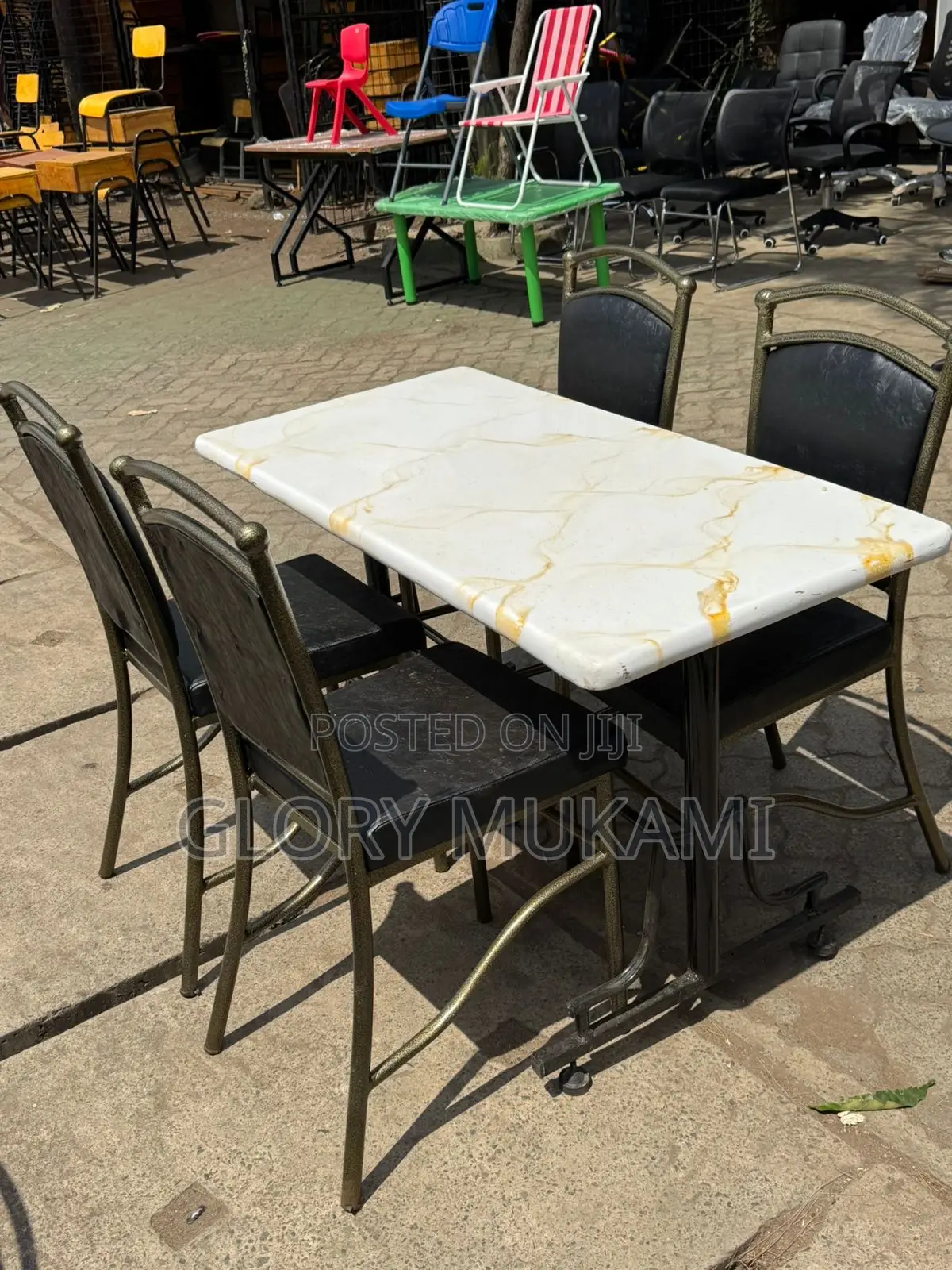 White Marble Table And Restaurant Chairs