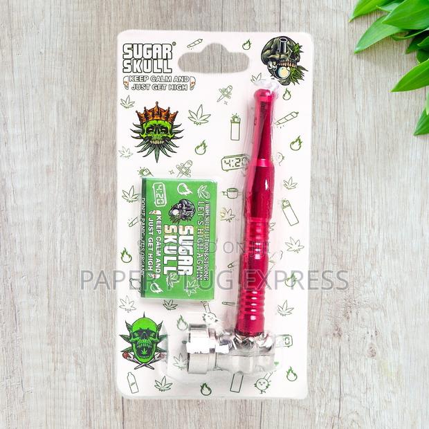 Red Sugar Skull Hand Smoking Pipe – Fiery Metallic Vibe - main view