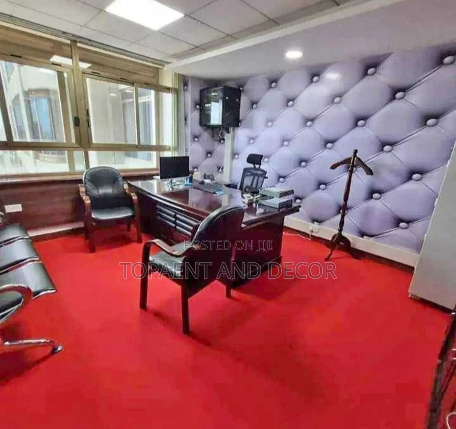 Smart Office Designed With Red Wall to Wall Carpet