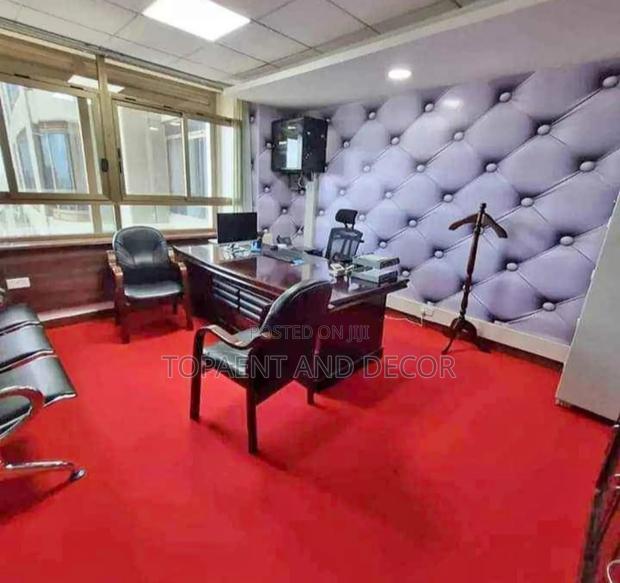 Smart Office Designed With Red Wall to Wall Carpet