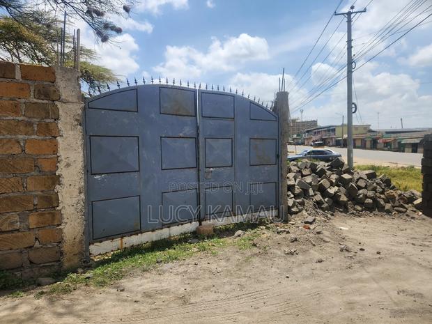 Prime Commercial 1⁄2 Acre Parcel Touching Tarmac - main view