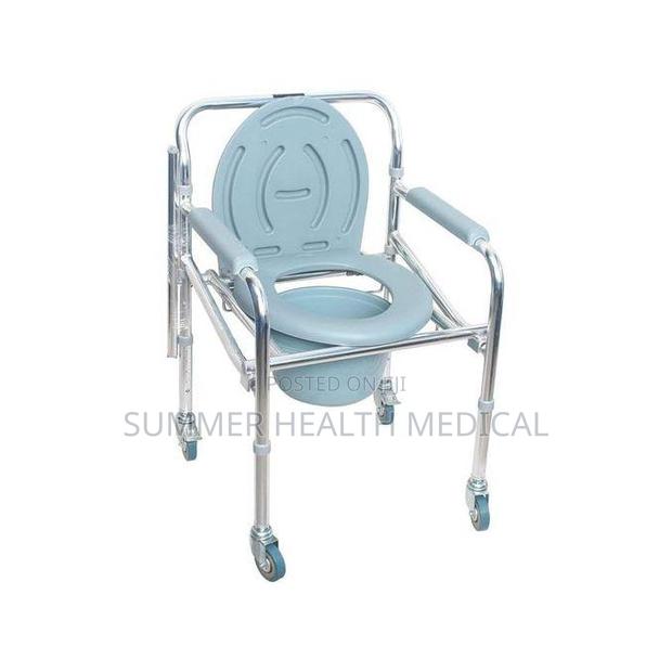 Commode Chair (Height Adjustable With Wheels