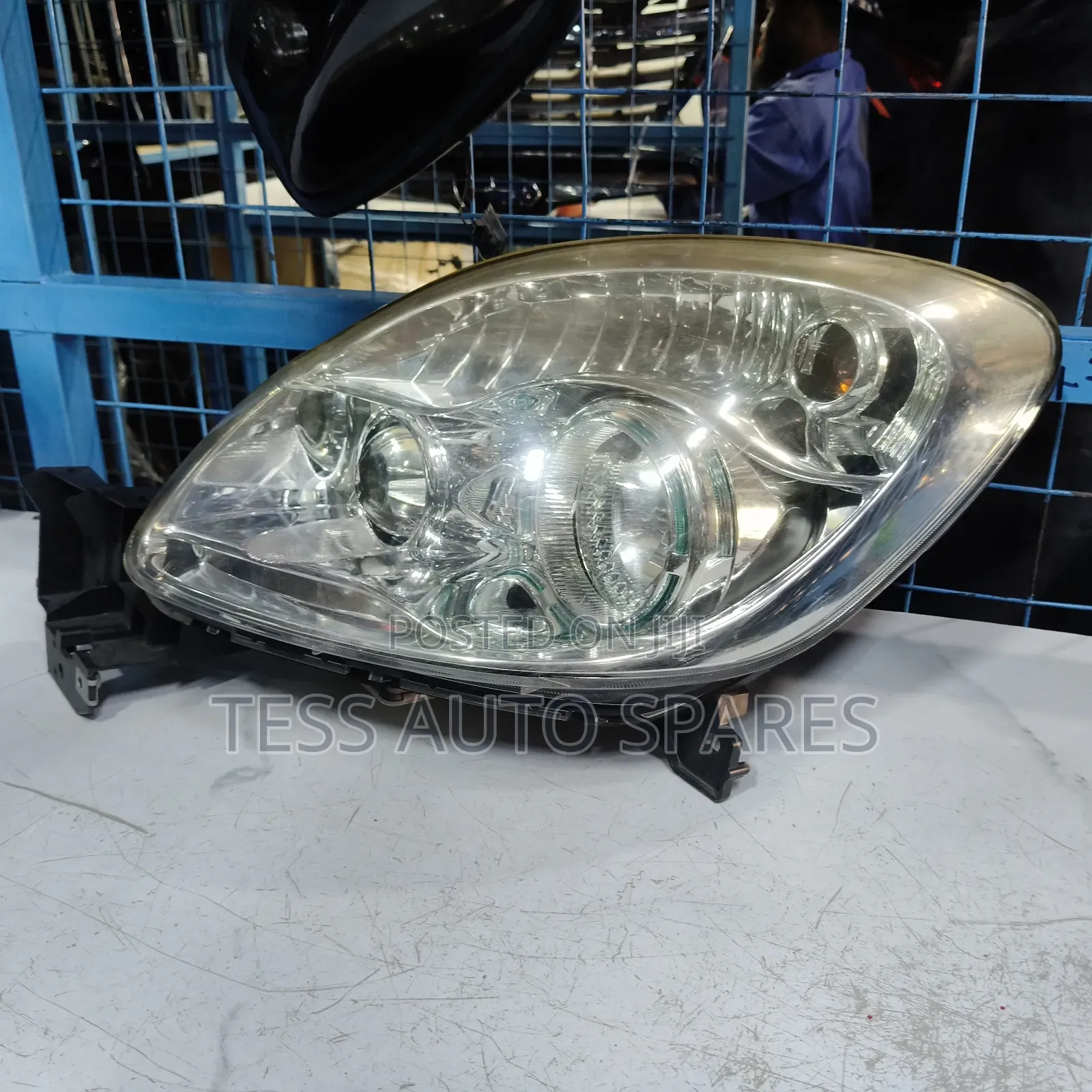 Mazda Verisa Headlight