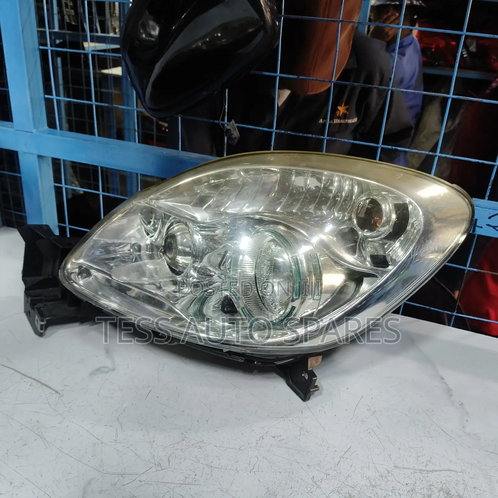 Mazda Verisa Headlight