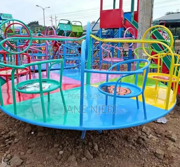 Swings, Slides Merry Go Round - main view