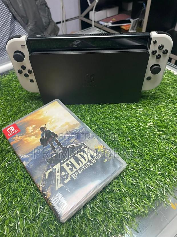 Toll Nitendo Oled With Some Games on Board.