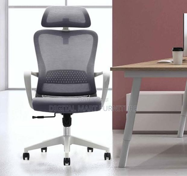 Office Chair: Modern Office Rolling Chair With Fixed Arms - thumbnail 2