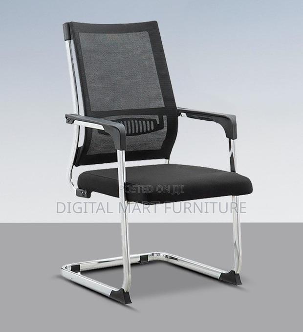 Office Chair: Modern Office Rolling Chair With Fixed Arms - thumbnail 6