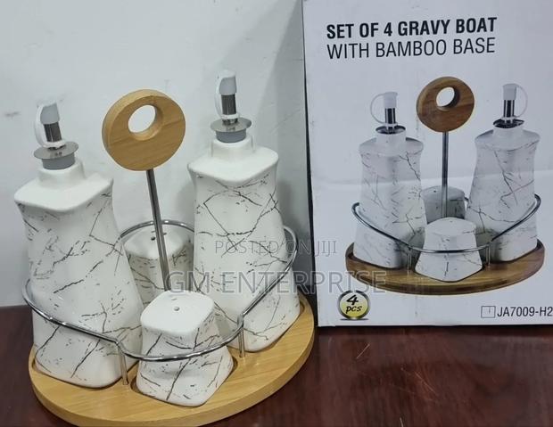 4 Ceramic Gravy Boat Season Oil Dispenser and Shakers on Bamboo Base