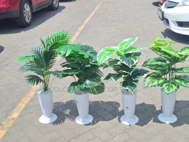 Straight Plastic Vase Plus Plant