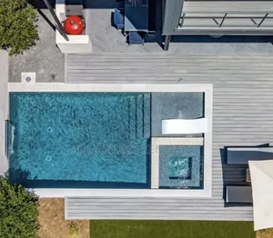 Swimming Pool Construction With Integrated Jacuzzi Installation