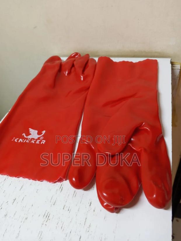 Cleaning Gloves. Pair Of Red Pvc-coated Work Gloves
